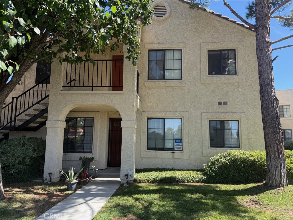 Desirable LOWER UNIT nestled in the gated community of Monte Vista offers a spacious living room with an adjacent dining area perfect for entertaining or relaxing in comfort. This well-maintained one-bedroom, one-bath condo features an open floor plan and abundant natural light. Ideal for morning, coffee, or evening unwinding. The kitchen boasts ample cabinetry and counter space, while the primary suite includes a generous closet and en suite bath. Enjoy the convenience of in-unit laundry, central AC, heating, and assigned covered parking. The Monte Vista community offers secure, gated access, beautifully landscaped grounds, and a sparkling pool for residents to enjoy. Located near shopping, dining, schools, and easy freeway access, 2554 Olive Drive number #31 is a fantastic opportunity for first-time, buyers, downsizers, or investors seeking a turnkey property in a Prime Palmdale location.