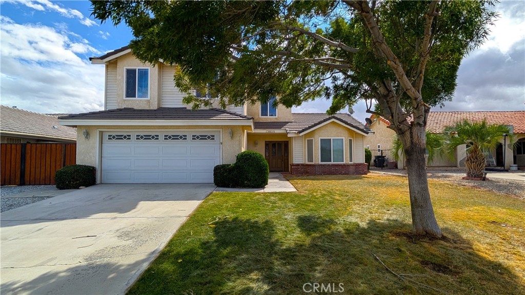 You do not want to miss out on this stunning 3 bedroom, 2.5 bathroom pool home located in Spring Valley Lake!!! Upon entering you'll notice, the rich yet tasteful tile, the natural wood banister, and gorgeous crown moldings that bring together a luxurious feel. Moving into the living spaces, you'll find beautiful laminate flooring that is complimented by more natural wood features and a lovely brick fireplace with a mantle that creates the perfect space for gatherings and staying cozy. The family room also has a bonus built-in wet bar, countertop, and cabinetry that would be great for enjoying a night in or entertaining guests. The kitchen is open to the family room and boasts a elongated breakfast bar, tons of cabinetry that even has some glass-fronts for showing off your finest valuables. This kitchen also features decorative diamond pattern tile backsplash, a built-in microwave, dishwasher, stovetop/oven, and abundant cabinetry for storage. The elevated dinning area has a pool view and extends into the living room that has beautiful bay windows. All of the bedrooms are located up stairs. The primary bedroom is spacious with a walk-in closet and a balcony that over looks the pool area and a beautiful view of the mountains. The primary bathroom features a soaking tub, a stand in shower and also includes dual sinks. The guest bedrooms are both good in size with a guest bathroom conveniently nearby. When entering the backyard you are greeted by a gorgeous view of the mountains. The backyard also includes a built-in pool and diving board perfect for entertaining or cooling off on those warm summer days!! As a resident of Spring Valley Lake, you’ll enjoy access to exclusive community amenities, including a private lake, beach area, marina, parks, and recreational activities. Additional perks include a clubhouse, gym, and optional membership to the golf course. This home is perfectly situated in a tranquil setting while still being close to shopping, dining, and entertainment. Another huge plus is that the home backs up to the Mojave River and has a private gate that leads straight onto a walking path which offers convenient access to ride bikes or exercise! This property is a fabulous buy! Don’t miss your chance to live in one of the most desirable communities in the area.
