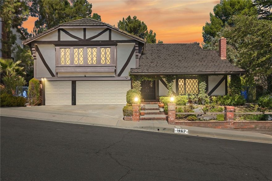Don’t miss this incredible opportunity—19317 Vista Grande Way is truly the best deal you’ll find in the Valley! This stunning 3,047 sq ft home sits on a massive 12,939 sq ft lot in the coveted Porter Ranch foothills, offering unbeatable value for the space, privacy, and lifestyle it provides. Featuring 3 bedrooms plus a large bonus room that is a blank canvas for buyers to imagine endless room possibilities, along with 3 full bathrooms, this property is perfect for families or anyone seeking room to grow. Inside, you’ll find beautiful wood floors, dramatic beamed ceilings, and an open, airy feel throughout. The chef’s kitchen is equipped with high-end Viking double ovens and a built-in Sub-Zero refrigerator, perfect for those who love to cook or entertain. The private backyard is a true retreat, complete with a sparkling pool, jacuzzi, and sauna, surrounded by trees and gardens for total serenity. Located in a quiet, safe cul-de-sac community with top-rated schools, scenic views, and easy access to shopping, restaurants, and plazas, this home delivers the ideal blend of comfort, location, and value. At this price, nothing compares—come see why this is the smartest buy in Porter Ranch!
