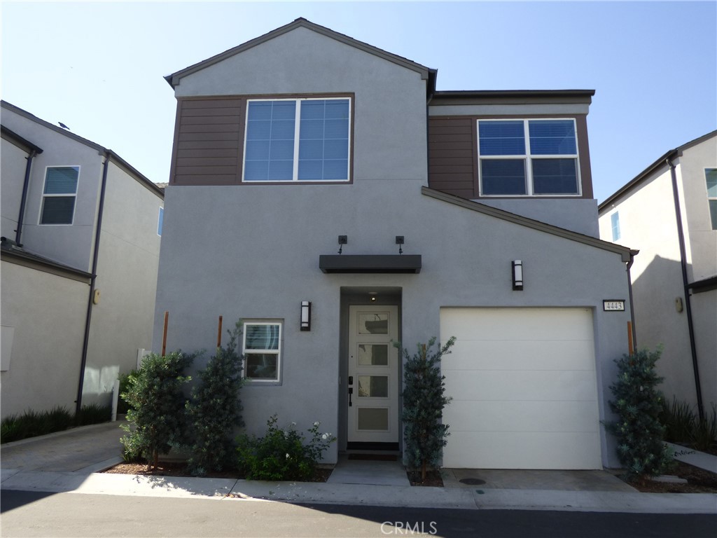 Step into elegance with this 2-story townhouse, a gem with no common walls, offering privacy and sophistication. Near the 60 and 15 freeways, vibrant parks, upscale shops, and restaurants, it’s a gateway to charm and convenience. Enter a warm sanctuary where every detail captivates. The first floor unveils a converted bedroom from the tandem garage, bathed in natural light, cooled by a ceiling fan, with a spacious closet—perfect for guests, an office, or retreat. Ascend the artisanal woodwork staircase to two luxurious bedrooms. The master suite, a sprawling haven with a stylish ceiling fan, boasts an opulent bathroom with dual sinks, spa-inspired walk-in shower, private toilet, and generous walk-in closet. The second bedroom enjoys a pristine full bathroom with deep bathtub and shower, ideal for relaxation. A laundry closet with stackable washer/dryer ensures effortless living. Plush carpeting upstairs complements chic laminated bathroom flooring, blending style and practicality. The gourmet kitchen inspires creativity with gleaming stainless-steel appliances—state-of-the-art stove range, oven, microwave with fan, dishwasher, and disposal. An expansive island doubles as prep station and stylish gathering spot, connecting to the adjacent dining area for shared meals and laughter. An elegant sliding glass door opens to a private patio with durable concrete flooring, perfect for BBQs or tranquil evenings with table and chairs. High-efficiency AC units ensure comfort. The garage, with cutting-edge tankless water heater, offers direct access, plus a dedicated parking space nearby. Immerse in a resort-like lifestyle with an Olympic-sized like pool, rejuvenating spa, state-of-the-art gym, BBQ area, fire pit, sophisticated clubhouse, playground, and lush garden. Every day feels like a vacation. Nestled in a dynamic neighborhood, this townhouse is moments from scenic parks, trendy shops, delectable dining, with swift freeway access for seamless commutes. This is a lifestyle of luxury. Schedule a tour today for your Home-Sweet-Home!
