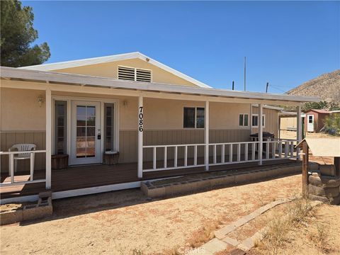 Photo of 7086 Sioux Ave, Yucca Valley, CA 92284 (MLS # JT26089388)