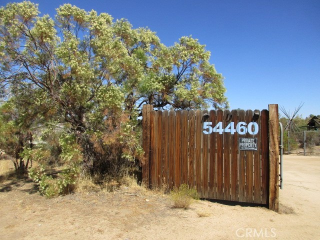 Opportunities for entertaining friends and/or family abound at this 5 acre property with a great view of Cahuilla Mountain. The garage has been converted to a family/recreation room with billiards table and TV for the perfect “hang out” spot. Between the home and rec room is a large outdoor space covered in flagstone, with fire pit and outdoor built-in BBQ area for gatherings. A huge fenced playground area has a basketball court, trampoline, climbing and play structures, and gazebo. There is also a 5000 square foot fenced garden area and RV utility hookups. There is still plenty of room on this all usable property for just about anything you can imagine, including horses, goats, sheep, chickens, etc. The newer manufactured home on a permanent foundation has an open floor plan, with 2 bedrooms on one side of the living space and the primary bedroom and bath on the other side. The inviting stone fireplace and hearth is the focal point of the living room. Come take a look!