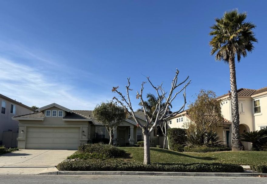 Harden Ranch neighborhood of Salinas, 1797 Windsor Street offers comfortable single level living in a well established community.  The well appointed kitchen features a breakfast bar and a separate breakfast nook, opening to a combined living and dining area with a glass sliding door to the backyard patio. The outdoor space with a variety of fruit trees, creating a pleasant extension of the living area. A fireplace insert in the living room adds warmth and ambiance. The spacious primary suite includes a glass sliding door to the backyard, a walk in closet, and a large tiled shower with double sink vanity and a separate toilet room. The hallway bathroom offers a clean shower over tub layout. A two car garage connects to an indoor laundry room with convenient access to the central hallway and kitchen.  Ideally located with quick access to Harden Plaza via Harden Parkway and additional shopping and services along Boronda Road, this home combines comfort, function, and location.