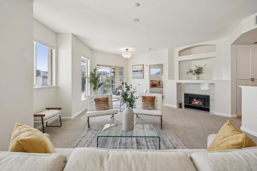 Beautiful bright top floor end unit with balcony in the heart of Redwood Shores. NO SIDE NOR TOP NEIGHBORS! Amazing condo has one primary bedroom suite plus a separate second bedroom, den or office room, offering ample space for versatility and functionality. Great open modern floor plan with 1.5 bathrooms, spacious 927 Sqft of living space, various large windows and sliding door providing abundant natural light. Tastefully remodeled kitchen with new quartz countertop and white shaker style soft close cabinets, stainless steel appliances including a gas range. Large living room with elegant modern fireplace and open to sunny balcony perfect for relaxation. Sunny and bright primary bedroom with ensuite bathroom with double sinks and walk in closet with built-in organizer. The separate bedroom, den or office is located on the opposite side of the living room, providing maximum privacy. In unit laundry, 1 garage&1 covered parking space. The desirable resort like Ventana Del Mar community offers a waterfront pool&spa, clubhouse, local parks&visitor parking. HOA covers water&garbage. Centrally located in the Peninsula&close to Bay Trail, parks, restaurants&award winning schools. Major employers nearby include Oracle, EA, Meta, Visa, Sony, Gilead. Quick access to Hwy 101, 92, 280.