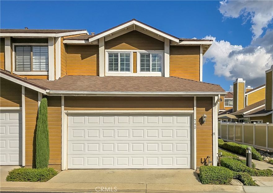 Stone Creek Planned Development, 3 bedroom, 2.5 bath end unit townhome. Features include new dual paned windows, freshly painted interior, updated kitchen, new carpet and refreshed patio landscaping. Open living room with brick fireplace overlooks the dining area. Kitchen features quartz counters,  subway tile backsplash, ample storage, free standing gas stove, stainless steel dishwasher and refrigerator. An upstairs hallway window seat is the perfect spot to sit and read. The spacious primary bedroom features 2 wardrobe closets, dressing area and en-suite bath. Two additional bedrooms and full bath off the hallway. Off the entry is a guest bathroom and direct access to the laundry area in the two-car attached garage. Glass sliders open to the beautiful private patio with newer fencing. Plantation shutters throughout. Ideally located in Stone Creek with walking paths to the pool and spa and through-out the well maintained grounds. With views of the foothills and mountain range, convenient access to the Claremont Wilderness Park, Thompson Creek Trail, Claremont Heights Shopping Center, local restaurants, coffee houses, cafès, Chaparral Elementary, Claremont High, Western Christian, Webb Schools, Claremont Colleges and California Botanic Garden. Easy access to the 210 freeway, Rapid Transit system, Claremont Depot and Metrolink. New roof 2024. $430 monthly HOA dues. Live the life you have imagined, live the life you deserve. Come home to 740 Lander Circle, Claremont.