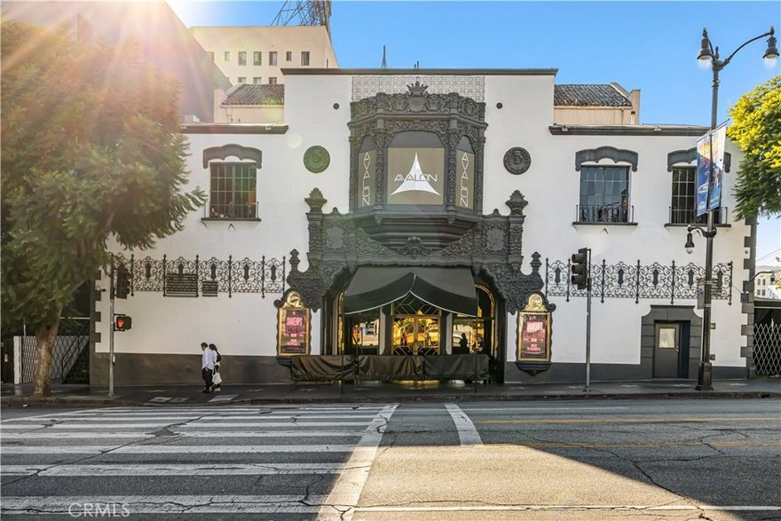 For the first time in over 50 years, one of Hollywood’s most celebrated landmarks is now on the market. The Avalon Theatre, formerly known as the Hollywood Playhouse, has been at the heart of entertainment history since its grand opening in 1927. Nestled at the world-famous intersection of Hollywood & Vine, this historic venue has hosted legendary performances and milestone moments, shaping the entertainment landscape for nearly a century.
Originally opened as the Hollywood Playhouse, the theatre quickly became a beacon for Broadway's biggest stars, hosting acclaimed live shows throughout the 1920s. Its rich history includes rebranding as The WPA Federal Theatre, The El Capitan Theatre, and The Hollywood Palace—each name representing a new chapter in entertainment history. From hosting CBS radio broadcasts to the variety show The Hollywood Palace, where stars like Judy Garland and Louis Armstrong performed, this stage has seen the giants of show business grace its boards.
Over the decades, the theatre evolved into a premier concert venue and nightclub, becoming a hub for global music legends. The Palace (as it was known in the '70s and '80s) became a West Coast answer to New York’s famed Studio 54, attracting icons like Prince, Madonna, and The Rolling Stones. It was also ground zero for the British Invasion, introducing the U.S. to Eurythmics, Culture Club, and Duran Duran, among others.
Renovated in 2002 and reimagined as AVALON Hollywood, this storied venue has continued to attract top talent and remains at the forefront of L.A.’s nightlife and entertainment scene. From Sasha’s West Coast DJ residency to performances by contemporary stars such as Bruno Mars at the adjacent BARDOT club, AVALON has maintained its position as a live entertainment powerhouse. The 2016 facelift has only further cemented its status, blending the original architectural beauty with cutting-edge technology.
This rare opportunity to own a piece of Hollywood history offers unparalleled potential. With its storied past, prime location, and state-of-the-art facilities, the Avalon Theatre is not just a building—it’s an institution with a legacy that continues to evolve.
Don't miss this chance to become the steward of one of Los Angeles’ most venerable entertainment venues. Contact us today for more details on this iconic property!