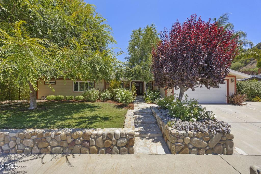 Welcome to Your Entertainer's Dream Home in the Heart of Ojai!This stunning 3-bedroom, 2.5-bath residence with a dedicated office combines elegant upgrades with an enviable lifestyle--nestled in one of Ojai's most picturesque and sought-after neighborhoods.Step inside to find rich hardwood flooring, 6-inch baseboards, crown molding, recessed lighting, and thoughtful details throughout. The spacious bedrooms feature custom closet organizing systems, while the main bath delivers a spa-like escape with a jacuzzi soaking tub.The chef's kitchen shines with granite countertops, a high-end Viking range, and beautiful natural light--perfect for casual mornings or gourmet evenings. Flowing seamlessly into the living room, you'll find an entertainer's bar with a wine fridge, built-in entertainment center, and a cozy gas fireplace. French doors open wide to a private backyard sanctuary.Whether you're hosting under the covered patio, grilling at the built-in BBQ, or soaking in the outdoor jacuzzi, this yard is made for unforgettable gatherings. Surrounded by native plants, succulents, and a bounty of fruit trees--orange, lime, lemon, peach, apple, and even a pixie tree--this fully landscaped paradise invites you to unwind. Bonus: full RV parking with hookups for visiting guests.Smart and secure features include Nest temperature control and wiring for a home alarm system.Beyond your door, experience all that Ojai has to offer--from serene hiking trails and lush nature preserves to seasonal summer festivals, artisan markets, and a thriving arts scene. Families will appreciate the area's excellent selection of private schools and a strong sense of community.This is more than a home--it's an invitation to live the Ojai lifestyle to the fullest