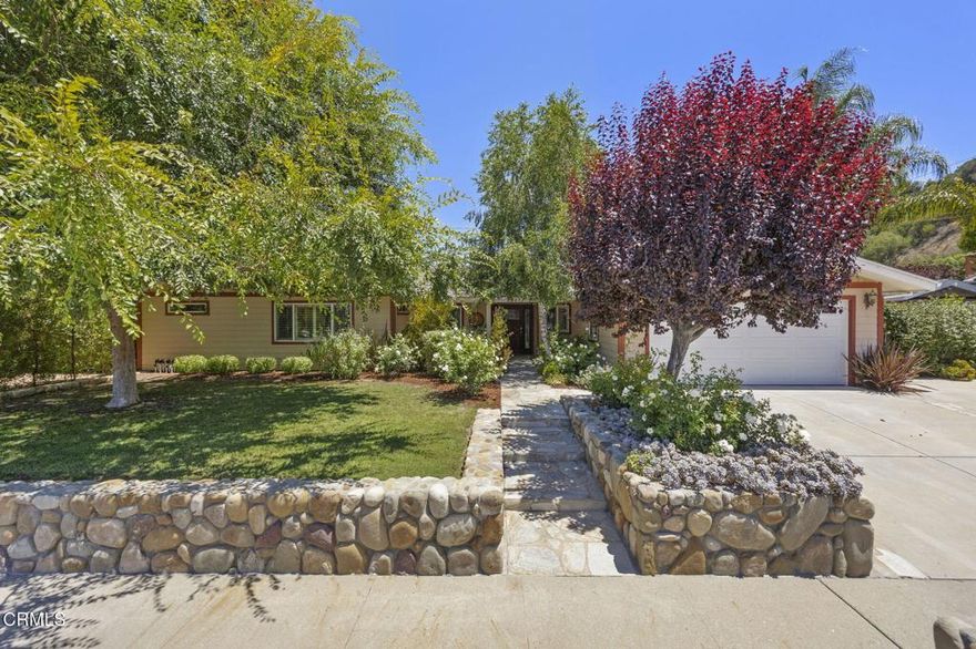 Welcome to Your Entertainer's Dream Home in the Heart of Ojai!This stunning 3-bedroom, 2.5-bath residence with a dedicated office combines elegant upgrades with an enviable lifestyle--nestled in one of Ojai's most picturesque and sought-after neighborhoods.Step inside to find rich hardwood flooring, 6-inch baseboards, crown molding, recessed lighting, and thoughtful details throughout. The spacious bedrooms feature custom closet organizing systems, while the main bath delivers a spa-like escape with a jacuzzi soaking tub.The chef's kitchen shines with granite countertops, a high-end Viking range, and beautiful natural light--perfect for casual mornings or gourmet evenings. Flowing seamlessly into the living room, you'll find an entertainer's bar with a wine fridge, built-in entertainment center, and a cozy gas fireplace. French doors open wide to a private backyard sanctuary.Whether you're hosting under the covered patio, grilling at the built-in BBQ, or soaking in the outdoor jacuzzi, this yard is made for unforgettable gatherings. Surrounded by native plants, succulents, and a bounty of fruit trees--orange, lime, lemon, peach, apple, and even a pixie tree--this fully landscaped paradise invites you to unwind. Bonus: full RV parking with hookups for visiting guests.Smart and secure features include Nest temperature control and wiring for a home alarm system.Beyond your door, experience all that Ojai has to offer--from serene hiking trails and lush nature preserves to seasonal summer festivals, artisan markets, and a thriving arts scene. Families will appreciate the area's excellent selection of private schools and a strong sense of community.This is more than a home--it's an invitation to live the Ojai lifestyle to the fullest