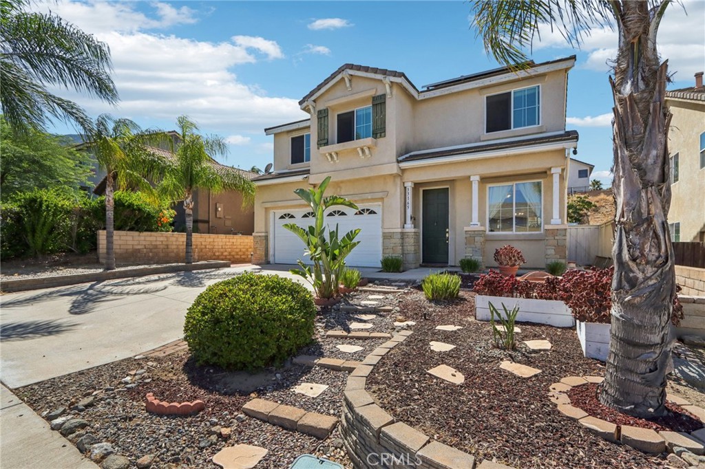 Spectacular Lake Elsinore Views! This 5-bedroom, 3-bathroom two-story home is located in one of the most desirable areas of Lake Elsinore. Enjoy the convenience of a downstairs bedroom with a full bath—perfect for guests or multigenerational living. The kitchen offers ample cabinetry and an open, modern design that flows seamlessly into the living areas. Upstairs, the spacious primary suite features a sweeping views of the Ortega Mountains. The other bedrooms are generously sized, and all bathrooms have been updated with modern finishes. Exit outside to your upgraded backyard terrace and soak in breathtaking views of the lake, surrounding hills, and mountains—an entertainer’s dream! The backyard features tiered terraces perfect for planting, along with side steps that lead all the way up to a custom paved terrace overlooking Lake Elsinore and offering panoramic views. Whether you're hosting gatherings or enjoying peaceful sunsets, this home is the perfect place to unwind and take in the beauty that surrounds you.