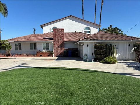 Photo of 8021 Duesler Ln, Downey, CA 90242 (MLS # DW26104000)