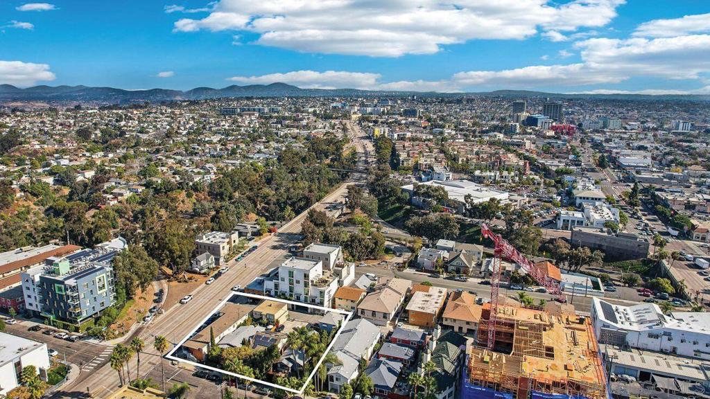 Property is being offered along with 3 adjacent parcels. The addresses for sale are 3967-69 8th Ave, 3973 8th Ave, 3975-77 8th Ave, 3983-89 8th Ave.