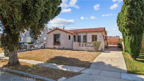 Photo of 9117 Dalton AVE, Los Angeles, CA 90047 (MLS # TR26230493)