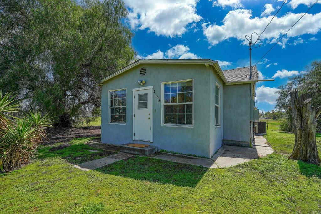 Remarkable find in the center of Ramona! 12.62 acres that is divided into 5 legal parcels per attached parcel map #19688 ranging in size form 1+ acres to 3+ acres. The terrain is gently rolling, all usable and ideal pasture land for horse/animal enthusiast, vineyard, olive grove or development of homes. (Please note attached S.D. County Covenant of Improvement Requirements that must be completed by BUYER prior to obtaining any permits for construction). The property is further enhanced by comfortable home with 1BR/1BA, 718m sq. ft, Det bungolow with Earth Stone wood stove and bath with claw foot tub, Det. Artist's studio and assorted storage buildings and detached workshop. A premium find and well suited for large family and friends for adjoining parcels and living pleasure