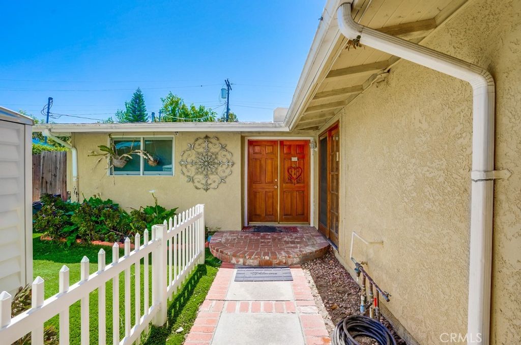 Photo of 20606 Skouras Drive, Winnetka, CA 91306 (MLS # OC25250237)