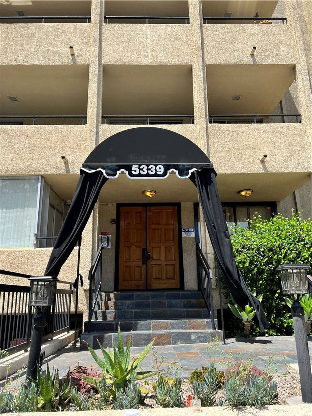 Photo of 5339 Newcastle Avenue #103, Encino, CA 91316 (MLS # SB22161072)
