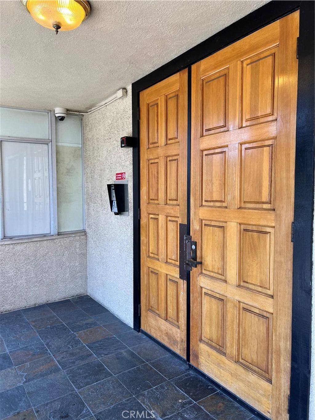 Photo of 5339 Newcastle Avenue #103, Encino, CA 91316 (MLS # SB22161072)