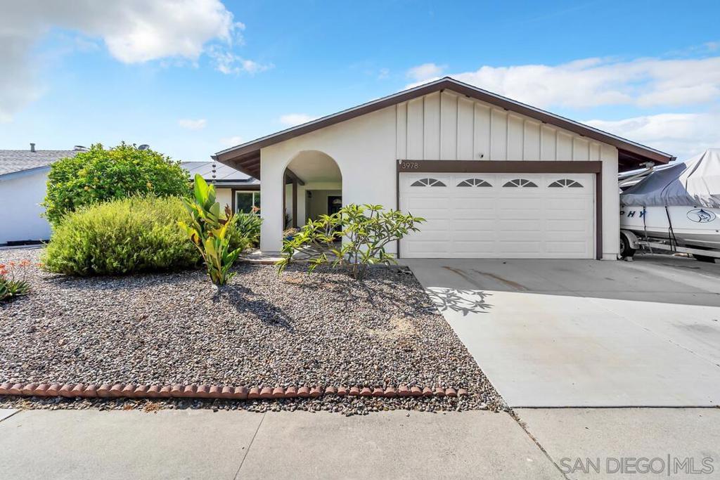 Welcome to 3978 Shenandoah Dr – Style, Comfort, PAID Solar with an Ocean View! This beautifully upgraded detached house offers the perfect blend of comfort and style. Featuring 4 bedrooms and a bright, open floor plan, this move-in-ready house boasts a modern open layout and stunning new tile flooring throughout. The upgraded kitchen flows seamlessly into the expansive living areas, ideal for both daily living and entertaining. Enjoy year-round energy savings with paid solar, resulting in minimal electric costs for the current owner, especially with the ocean breezes. Future utility costs may vary depending on usage. The home also includes central AC, a newer roof, upgraded dual-pane windows, and a stylish new front door. Step outside to your landscaped backyard oasis, featuring pavers, a custom pergola, and a fully fenced 6ft privacy wall. Take in the ocean views, relax in the cool coastal breezes, and enjoy fresh produce from your mature fruit trees (lemon, orange, and nectarine) and turnkey vegetable garden. The rain gutters are fully covered for easy maintenance, and there’s even additional space for boat or RV parking. Conveniently located just minutes from the beach and with easy access to the 5, 76, and 78 freeways, this home is the ultimate Oceanside gem. Experience the perfect mix of coastal charm and modern upgrades.