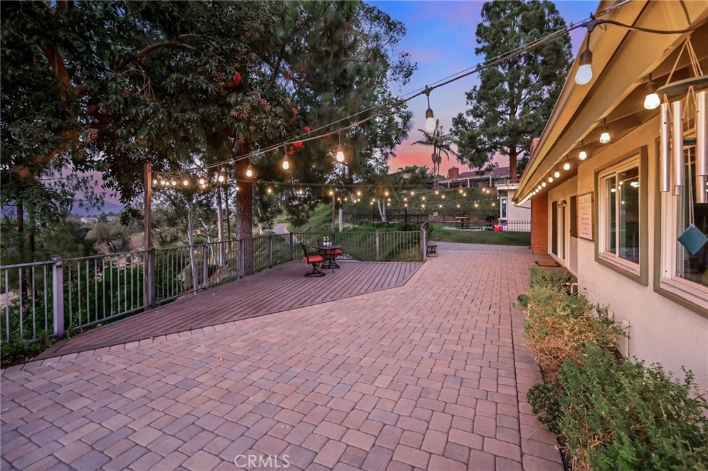 Stunning Panoramic Views from 4-Bedroom Single Story with No Inside Steps! Approx 2,271 Square Feet All on One Level ... this Beautiful Move-in-Ready Broadmoor Home is Surrounded by Nature & Gorgeous Views of City Lights, Green Trees & Snow-Capped Mountains - Spacious Open Floorplan has High Vaulted & Beamed Ceilings with 4 Skylights & Recessed Lighting Throughout - Charming Gated Front Courtyard has a Private In-Ground Spa with Soothing Rock Waterfall - Impressive Double Beveled Glass Entry Doors Open to Elegant Upgrades Including 8" Crown Moldings, Wood-Paneled Walls, Travertine & Engineered Hardwood Flooring, Plantation Shutters & More - Formal Living Room has Fireplace with Mantle & Hearth - Formal Dining Room - Two Oversized Sliding Glass Doors Invite the Outdoors In - More Sweeping Views from the Kitchen Equipped with Wood Cabinetry, Corian Countertops, Breakfast Eating Nook & Newer Appliances, Including Microwave, Dishwasher, Trash Compactor & Electric Dual Oven/Cooktop - Kitchen is Open to Family Room with Entertainer's Wet Bar - Double Door Entry to Primary Suite with Dual Closets & Window Seat - Primary Bathrooms Offers Dual Granite Vanities & Large Walk-In Shower - 3 Additional Bedrooms All Have Ceiling Fans & Mirrored Wardrobes - Updated Hall Bathroom with Granite Vanity & Tub/Shower, Plus 1/2 Bath Powder Room for Guests - Convenient Inside Laundry Room with Storage - Attached 2-Car Garage has Access to the Home Through the Courtyard - Low-Maintenance Artificial Turf & Landscaping in the Front Yard - Handsome Belgard Pavers, Plus Trex Composite Deck in the Backyard, the Perfect Spot for Outdoor Dining & Entertaining - Water Softener System - Newer Water Heater (2024) - Newer Roof (2023) - Updated HVAC System - Nearly All Newer Dual-Pane Windows - Low $202/month HOA Dues to Enjoy Assoc Spa, Two Community Pools (one is just across the street) Tot Lot Playground & Beautifully Maintained Greenbelts - No Mello Roos Tax - Just Minutes from Top-Rated Schools, Shopping, Dining, Walking/Hiking Trails, Golf Course & Walnut Canyon Reservoir