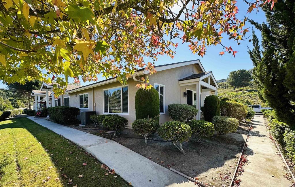 This is the one you have been looking for that has it all - unbeatable Location with Panoramic Views from Living Room and Home Office/Bedroom, Single Story fully accessible home, nestled away in a quiet newest section of the Oceana 55+ community - Mission IV! In addition to the Views, this well cared for property features brand-new luxury vinyl flooring throughout the home as well as new tile on the covered patio plus updated modern lighting. There are two bedrooms and two full baths all on one level, open concept living and dining areas offer breathtaking views. Kitchen has been recently updated. Full-size washer and dryer are conveniently located in the attached one-car garage. When you are not entertaining or relaxing on your private patio, you will love making friends at the multitude of events that are offered through the homeowners association! Enjoy a game of pool at the recreation center or lounge at the pool and spa - you will not want to leave! Homeowner's association fee includes all of landscaping, roof maintenance, water, sewer, trash pickup, cable, road maintenance and all of the amenities. Whether you are looking to move in right away or make an investment, this home is the perfect choice!