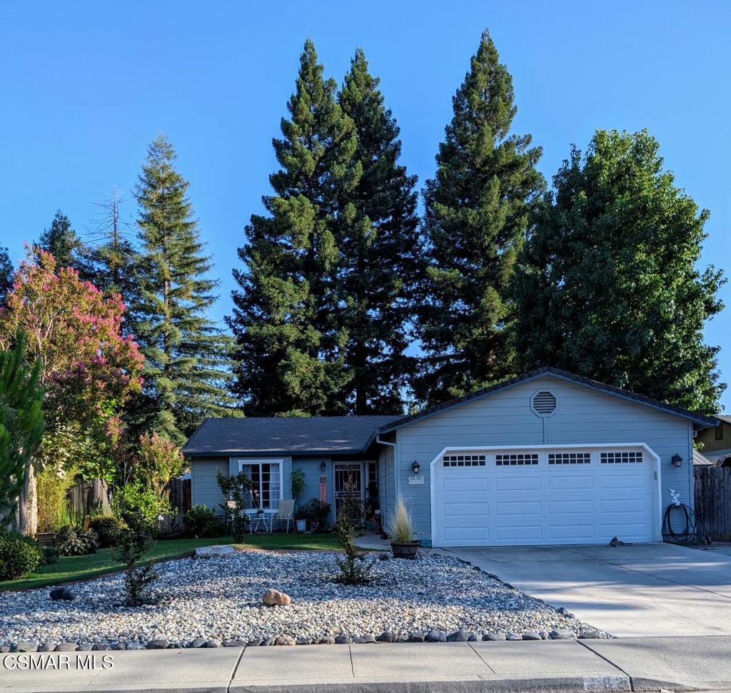 This beautifully maintained home features an open-concept living room, dining area, and kitchen with vaulted ceilings and easy-care, no-scratch laminate flooring (installed Feb. 2020). Each bedroom and the living room are equipped with ceiling fans, adding comfort and energy efficiency year-round.The cozy bedrooms are filled with natural light, and the spacious principal bedroom includes his-and-hers closets and a sliding glass door that opens to the inviting backyard. The principal bathroom was upgraded in Jan. 2020 with a stylish step-in tile shower and matching tile flooring, while the family bathroom includes a convenient tub/shower combo.Enjoy a serene backyard retreat--perfect for morning coffee or al fresco dining--surrounded by mature fruit trees including avocado, nectarine, naval orange, and tangerine, as well as beautiful flowering plants.Recent Upgrades Include:New carpet in bedrooms (Feb. 2020)Whole house fan (July 2022)New HVAC system (May 2023)Shingle Shield roof rejuvenationCeiling fans in all bedrooms and living roomDon't miss this move-in ready home that offers both comfort and charm, inside and out!