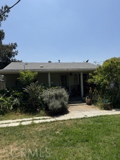 REDUCED PRICE! Property is centrally located near schools, freeways and shopping. The huge lot is ideal for family gathering, an additional unit or just relaxing with your pets in the rear yard.
