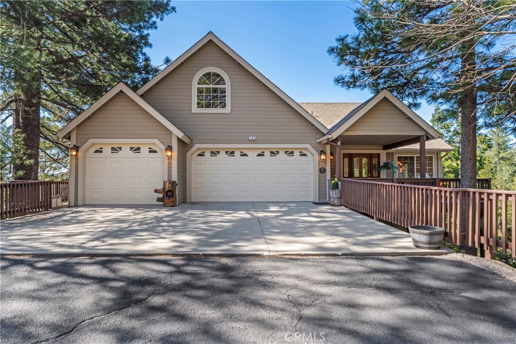 6 bedrooms/6 bathrooms, 4,265 sq ft luxury Mountain Lodge on a private .49 acre parcel in the Summit area of Lake Arrowhead! A special property that checks off all the boxes for the ultimate vacation retreat or full time family residence. One of the best backyards in Arrowhead, custom designed & fully fenced with a heated swimming pool, in ground spa, artificial turf terraces, sun bathing patio, and trampoline play area! Enjoy Summer time BBQs from 2 oversized Trex decks boasting breathtaking, unobstructed, Eastern Mountain and lush evergreen forest views. Level entry from the front door & large 3 car garage which conveniently enters right into the kitchen. A spacious entertainers kitchen offers stainless appliances, double oven, large center island w/ prep sink(granite counter) and custom cabinetry throughout with high end Quartzite. Vaulted ceilings and solid wood flooring throughout a massive living/dining room open concept floorplan, perfect for hosting the holidays around the cozy stone fireplace. Middle level includes a master en suite complete with a romantic corner stone fireplace, walk in closet, jetted tub/shower tucked in a corner wall of glass with soothing tree top views. Middle level continues with 2 guest bedrooms, a full guest bathroom and an expansive exercise room! To finish off the middle level there is a 3rd guest bedroom en suite with private deck attached. Lower level offers solid wood flooring throughout the game room and corner mini bar. A kiddo bunk room with full bathroom and 6th guest bedroom en suite making this level ideal for guest’s private quarters. A 3rd deck leads from game room down to the pool grounds. There’s even a powder room bathroom poolside! An abundance of amenities including; A/C, whole house solar energy by Sun Run, gasoline generator electric sub panel, multiple storage areas/attic space over garage, full lake rights to private Lake Arrowhead, and tract underground utilities. This exquisite property has been loved and meticulously cared for, ready for the next family to create their own mountain traditions. Truly one of a kind, schedule your private tour today!