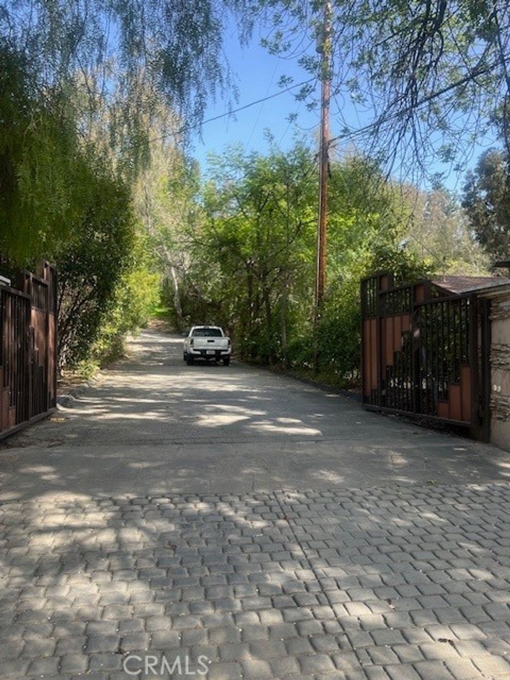 Photo of 4950 Vanalden Avenue, Tarzana, CA 91356 (MLS # SR25181001)