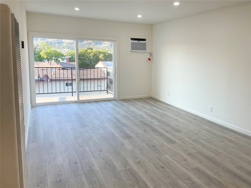Step into this stunningly remodeled 1-bedroom, 1-bathroom unit located in the heart of Glendale! This home has been completely renovated from top to bottom, offering modern style and comfort throughout. Enjoy laminate flooring, recessed lighting, and abundant natural light that fills the space. The all kitchen features sleek granite countertops. Additional wall heating and wall air conditioning, and new windows that enhance both energy efficiency and aesthetic appeal. Ideally situated near the 134 Freeway, this unit offers easy access to shopping, dining, and entertainment. Don’t miss this beautifully updated unit