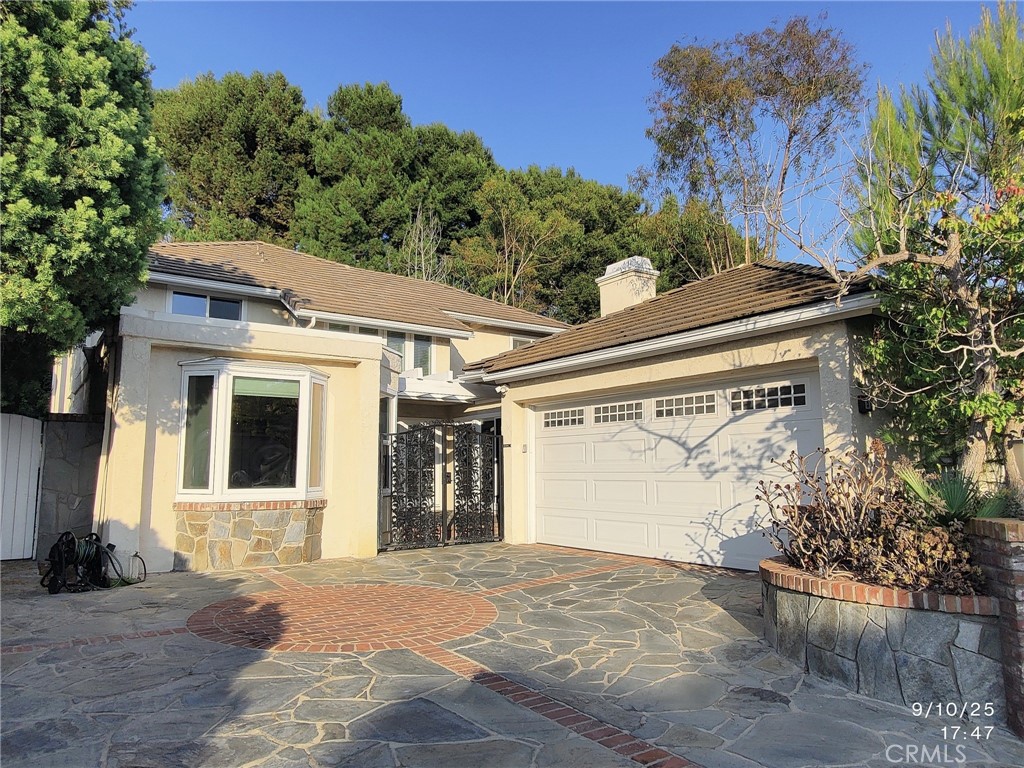 Welcome home to 5 Night Star which is located in a prestigious neighborhood! This elegant home with no neighbor behind offers comfort, space, and an ideal location directly across from Turtle Rock Community Park. It boasts an open floor plan, abundant natural light, and three fireplaces in the living room, family room and Primary bedroom, offering perfect spots to relax or gather with family. The gourmet kitchen features stainless steel appliances, granite countertops, kitchen island, breakfast counter. 5 bedrooms 3 full baths with a bedroom suite downstairs facing front, private and bright. Small bedroom facing side yard, upstairs master bedroom suite extends out to greenbelt view balcony, master bath tastefully designed soaking jet tub next to 2-people shower with stone wall and floor. BR 2 and BR 3 share a hallway bath, upgraded dual contemporary glass raised sinks, shower in tub, easy for family members to enjoy. Downstairs exotic marble floor throughout, walnut hardwood floor from stairs to entire second floor gives warmth and coziness. Staircase with custom wrought iron exotic finishes adds luxury living to its finest. Long driveway outside the gated front porch, easy access 2-car side by side garage. Minutes away from the top ranked University High School. Conveniently located near UCI, Fashion Island, local hiking spots, and the beach, this home offers an excellent opportunity to enjoy all that Irvine has to offer.