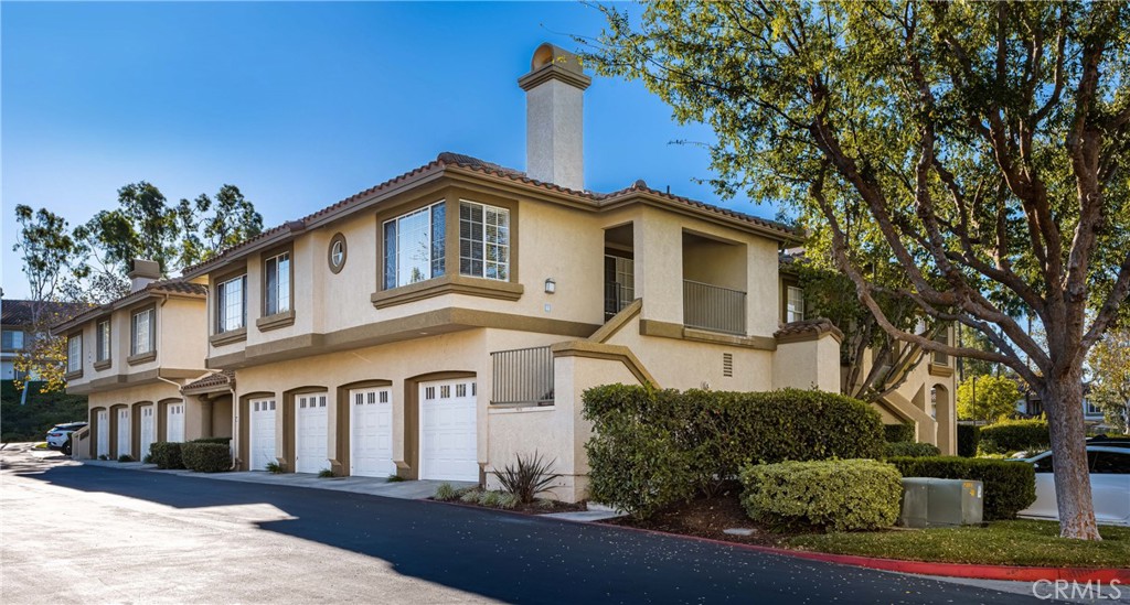 Beautiful 2 bedroom, 2 bathroom, upper level, end unit, single story condo with peek mountain views in the community of Casafina in Rancho Santa Margarita. This is one of the cleanest rental units you will find. Freshly painted. Enjoy laminate wood flooring, an inviting fireplace and a large kitchen. The kitchen offers granite counter tops, a breakfast bar, white appliances with a newer refrigerator. The ensuite master bedroom features vaulted ceilings, ceiling fan and a large closet with organizers. The ensuite bathroom features a dual vanity and a soaking tub with shower combo. The guest bathroom was just updated with a new vanity, a quartz counter top, newly tiled shower enclosure and all new fixtures. Additional property highlights include a private front patio and a 1 car garage with direct access. Washer and Dryer are located in the garage. Community amenities include a swimming pool, spa, and playground. Convenient to nearby schools, parks, shopping plazas, and easy access to The Toll Roads! *** PLEASE READ *** The lease term is for 12 months or more only. Move in costs will be $5990 (First months rent $2995 + Security Deposit of $2995). MINIMUM VERIFIABLE INCOME OF 3X RENT PLEASE. FICO OVER 700 PLEASE. Pets will be considered and will require an additional $500 per pet if approved. Tenant is responsible for the first $150 of repairs. Tenant will need to provide renter's insurance prior to possession of the unit. The unit comes with 2 parking spaces (1 car garage and 1 assigned uncovered space (Labeled space #1)) The owner will consider applications with Tenant concessions.