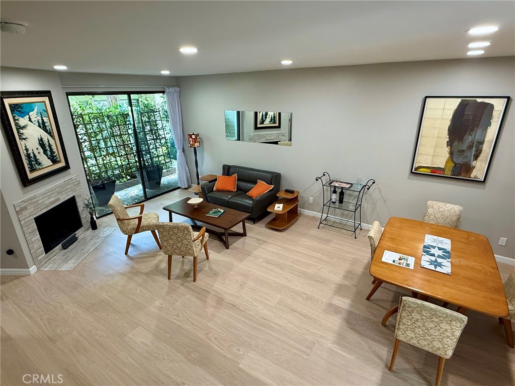 Welcome to a townhome where quality renovation meets coastal living. Meticulously upgraded, this sun-filled residence combines timeless design with modern comfort, creating a space that feels both stylish and enduring.
At its heart, the kitchen flows directly onto a spacious private patio, offering seamless indoor–outdoor living that’s perfect for entertaining or everyday relaxation. Custom cabinetry, new appliances, and an open layout highlight its functionality, while wide plank oak floors, hand-finished copper accents, and Kohler fixtures add craftsmanship and warmth. Throughout the home, curated mid-century details and 9’ ceilings elevate the sense of style and light.
Upstairs, both bedrooms feature ensuite baths, vaulted ceilings, and generous closets — including a walk-in in the primary suite. Additional conveniences include in-unit laundry, central HVAC, and an attached private 2-car garage with direct access.
Set within a gated 12-unit community close to Montana Avenue’s shops and cafes, Whole Foods, the beach, and UCLA Medical Center, this home blends design, comfort, and lifestyle — a turnkey opportunity in one of Santa Monica’s most desirable neighborhoods.