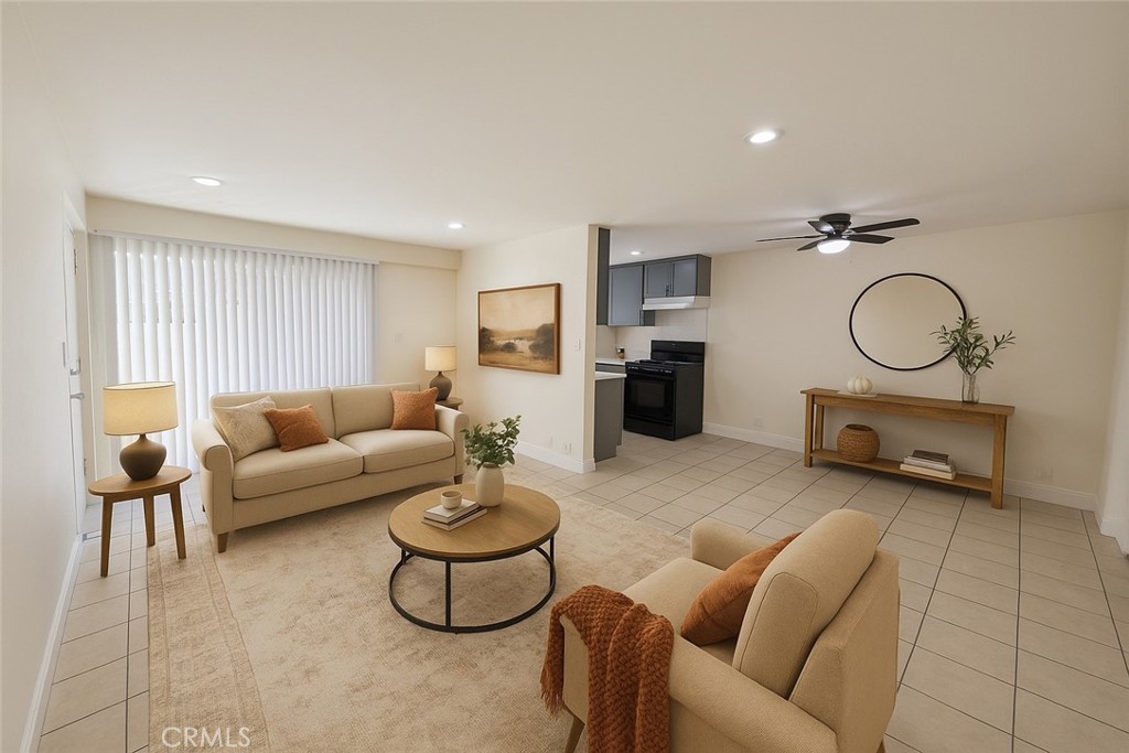 Welcome to this beautifully updated 2-bedroom, 1-bath apartment located in the heart of Van Nuys. This spacious unit features an open and bright floor plan with tile flooring throughout the living areas and modern wood-style flooring in the bedrooms. The large living room offers recessed lighting, fresh paint, and sliding glass doors that open to a private patio area, allowing for plenty of natural light. The kitchen has been tastefully updated with granite countertops, ample cabinet space, and a stylish subway tile backsplash, complete with a gas stove and modern fixtures. Both bedrooms are generously sized and include ceiling fans, recessed lighting, and large closets for extra storage. The bathroom features an updated vanity with granite countertops, tile shower walls, and a clean, modern look. Additional highlights include air conditioning units, energy-efficient lighting, and an overall bright and inviting atmosphere. Conveniently situated near major freeways, public transportation, shopping centers, restaurants, and schools, this charming apartment offers comfort, convenience, and a central location perfect for any lifestyle.
