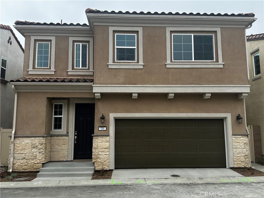 Must See!!!  Brand new build & everything new.  Open floorplan home in a gated community in a highly desirable area in City of Upland.  Well-planned living space that perfectly balances efficiency and comfort. With 3 bedrooms and 2.5 baths, this delightful home is ideal for families looking to expand or those who simply desire extra room. The main floor's open-concept design beautifully connects the living and dining spaces, making it perfect for cozy weekends or family get-togethers. All-Electric Home: Step into a modern lifestyle with sustainability and energy efficiency at its core. Owner's Suite: Pamper yourself in a luxurious suite complete with dual sinks, a separate tub and shower, and a spacious walk-in closet. Mezzo - White Fawn Option Package: Relish in the elegance of white cabinetry, quartz countertops with a full tile backsplash, Shaw LVP flooring, Shaw carpet, and brushed nickel Kohler fixtures.