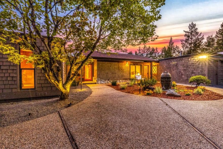 Mid-Century Modern Gem with 5-Bedrooms, 3-Full Bathrooms, 2-Half Bathrooms,  3,860 Sq Ft, situated on 2.9 acres of mostly flat usable land with full sun all day and spectacular ocean views. The main house offers 3-Bedrooms, 2-Full Bathrooms, and 2 Half Bathrooms. A true Mid-Century Modern with clean lines, seamless indoor-outdoor living with expansive windows, high open beam ceilings, slate floors, sunken living room with 2-way stone fireplace, built-in couches, hidden wet bar and workspace, Large kitchen w/newer appliances, laundry room and a serene primary retreat. The 2 additional bedrooms have their own private wing with a sitting area and full bathroom. The attached ADU has 2-bedrooms, 1-bathroom, private entrance, full kitchen, living room with slider to back patio. The ADU is perfect as a private guest wing, multi-generational living, or to rent out. Solar panels and batteries are fully owned, 3 sheds and oversized garage for all your storage needs. This is a rare opportunity to own such a spacious property with stunning architectural features and breath-taking ocean views. Located next to Loma Prieta Winery. Visit Rancho Prieta today, before its gone.