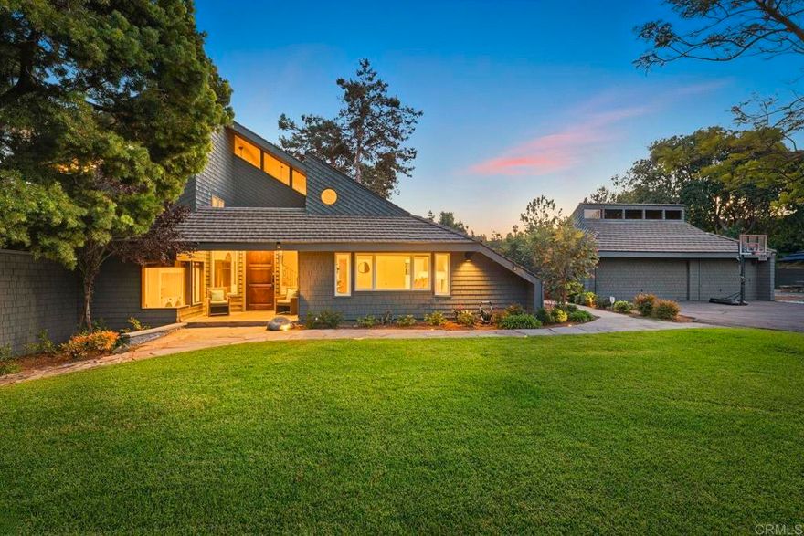 One of a kind resort-style living in this exceptional estate perfectly situated on a nearly acre lot in the highly desirable community of Olivenhain. This exquisite 4 bedroom, 3.5 bathroom home boasts 3,198 square feet of living space blending sophistication and comfort with elegant design.  Inside, expansive living spaces are bathed in natural light, featuring refined finishes, high ceilings, and seamless indoor-outdoor flow. The chef’s kitchen, serene primary suite, and beautifully appointed guest rooms offer comfort and style at every turn. This luxurious residence features energy-efficient solar power and a sparkling pool surrounded by lush landscaping creating your own private sanctuary for entertaining or relaxation. Enjoy the rural lifestyle known for its charm and elegance while still being close to dining, shopping, award winning schools, the beaches, freeways and everything the Encinitas lifestyle has to offer.  Don't miss this rare opportunity to own this extraordinary custom residence in one of San Diego's most desirable communities. Your dream home awaits!