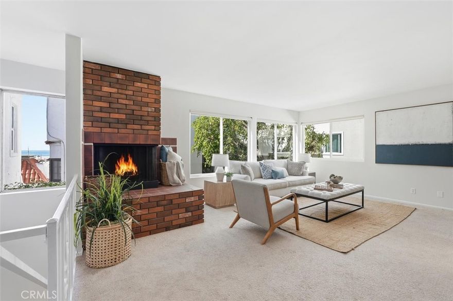 Welcome to your coastal retreat! This sweet 2-bedroom, 2-bathroom beach house offers a coveted peek-a-boo ocean view and is just steps away from the sand. Featuring a 2-car attached garage, you can park your car and enjoy the best of Hermosa Beach on foot or by bike all weekend long.



Inside, the home has been freshly painted and includes updates to both bathrooms. You'll love the character of the original tile entry, the comfort of dual-pane windows, and the convenience of updated kitchen appliances. The light and bright living room features three large windows and a cozy fireplace—perfect for relaxing after a day at the beach.



Located in quiet south Hermosa Beach, you'll enjoy access to top-rated schools, fantastic restaurants, and plenty of local shopping.



Opportunities to own a single-family home this close to the beach at this price point are rare—don’t miss your chance to make this coastal gem your own!