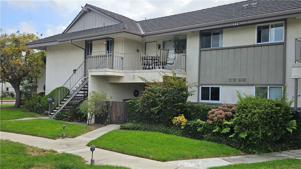 This charming, 2-bedroom + Den , upper unit at New Horizons South Bay. Featuring an open entry with a large living room, enhanced by a wood burning fireplace. This well-designed interior living space offers comfort and two spacious outdoor balconies. Freshly painted, new dishwasher, luxury vinyl, water heater and dishwasher. Two large outdoor balconies for entertaining. The appeal doesn't stop there; this 55+ senior living community boasts a plethora of amenities that enhance your lifestyle. Imagine having access to not one, but two sparkling pools and Spa for those sun-soaked days, a sports center with a well-equipped gym, his and hers dry sauna, ping pong room, craft shops including the popular ceramic hobby shop. Activities at the Sports Center include the Tennis/Pickle Ball court. The heart of the community is the Clubhouse for gatherings, many planned social clubs and events. The Community Room and Lounge are available for Owners private functions. For those who enjoy golf, the 9-hole golf course, putting green, driving cage and picnic area is accessible from the Club House. These are just a few of the many amenities waiting for you here. New Horizons is more than just a place to live; it's a place to thrive and enjoy the good life.