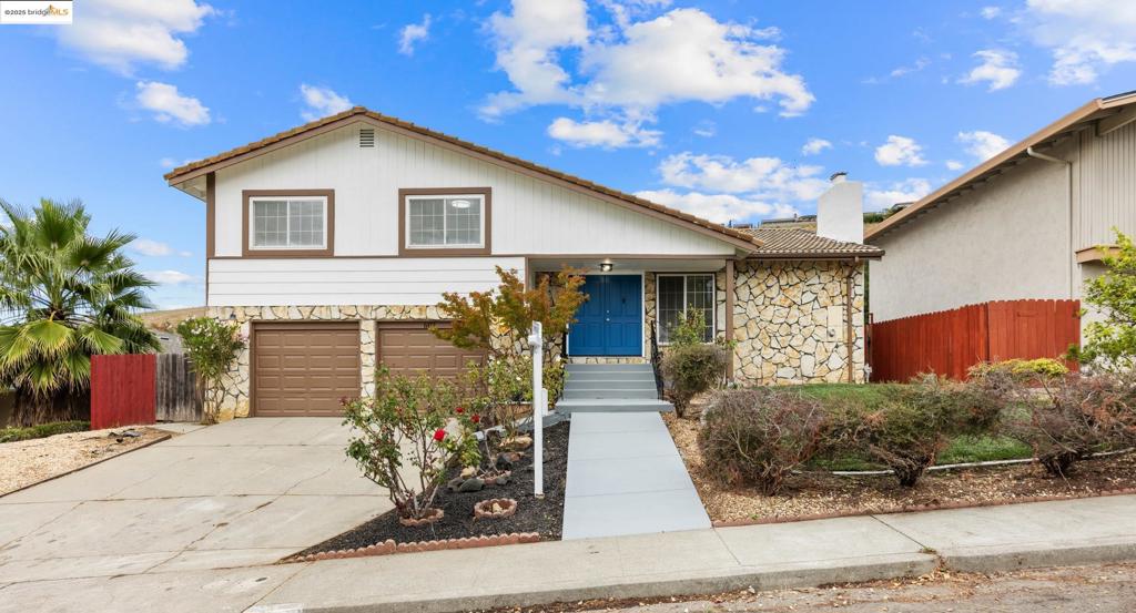 North Hills Living at Its Finest!Perched at the top of Vallejo’s desirable North Hills, this beautifully upgraded home blends modern style with everyday comfort. Nearly everything has been refreshed inside and out! Fresh paint sets the stage as you step inside to find new flooring, sleek kitchen cabinets, sparkling appliances, and updated electrical in the kitchen and baths. Enjoy stylish lighting, ceramic tile, and renovated bathrooms with new toilets, vanities, and mirrors. The living room features a modern electric fireplace, converted from gas for a clean, cozy vibe. From inside the kitchen, look through your garden window and daydream while doing dishes, escaping into the rolling hills, a daily reminder of the beauty around you. Out back, a rare double deck offers sweeping mountain and hill views with no rear neighbors, perfect for entertaining or relaxing under the stars. A new front lawn and updated sprinklers add curb appeal, while upgrades like new plumbing, water heater, A/C system, sub-panel, and smart alarm system provide peace of mind. The master shines with a fresh textured ceiling, while details from baseboards to door updates make this home truly move-in ready. Nestled in a quiet hillside community, it offers privacy, views, and the perfect blend of tranquility.