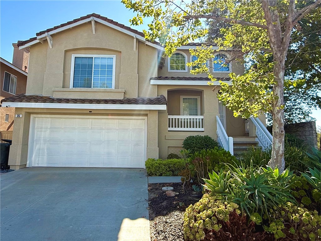 Immaculate California Summit home with canyon views of Laguna Beach's Top of the World. Best value 4 bedroom 2.5 bath home in Aliso Viejo! Wonderful oversized great room with cathedral ceilings and a walk out 2nd floor deck with canyon sunset views. Tons of windows! This house is light and bright. Home has a 9.2 kW solar system - tenants will PAY ALMOST NO ELECTRICITY BILLS with typical usage. That is a HUGE savings on your budget! Spacious primary bedroom suite features a walk in closet and primary bathroom with double sinks. Three other bedrooms are downstairs, including the spacious 4th bedroom or play room with solid wood double doors, recessed lighting and glass sliding door to the lovely back yard. Big back yard features a patio seating area big enough for 6, a wide turf play area and space for covered seating. Location is perfect for early morning jogging in Soka University right across the street or mountain biking in the Aliso & Wood Canyons Wilderness Park right at the bottom of the hill! Canyon Vista Elementary School is a short walk away, and Aliso Town Center is convenient with everything one could need. No PETS! No Smoking!