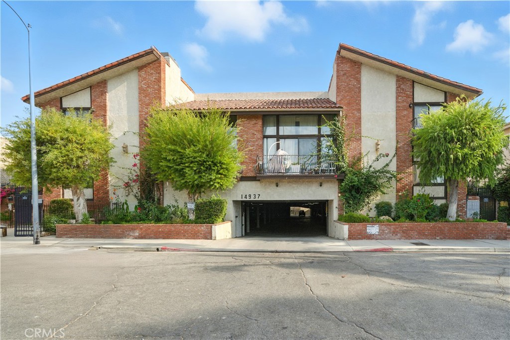 Welcome to this great two-story condo in the heart of Van Nuys! Offering 3 spacious bedrooms and 3 bathrooms, this home blends comfort and functionality with a layout designed for modern living. Step inside to a bright and inviting living room featuring a cozy fireplace and sliding doors that open to a private back patio perfect for relaxing. The step-up kitchen boasts sleek quartz countertops and seamlessly connects to the dining area and overlooks the living space, making it ideal for gatherings. Upstairs, you’ll find all three bedrooms, including a generous primary bedroom with its own balcony and a private ¾ bath. A full hall bathroom serves the additional bedrooms, while a convenient half bath with laundry is located downstairs. Central AC ensures year-round comfort. Enjoy the perks of community living with access to the association pool and spa, plus the security of a 2-car detached subterranean gated garage. Nearby schools, parks, shopping, and dining make this an unbeatable location for both convenience and lifestyle. Don’t miss this opportunity to own a home that has it all.
