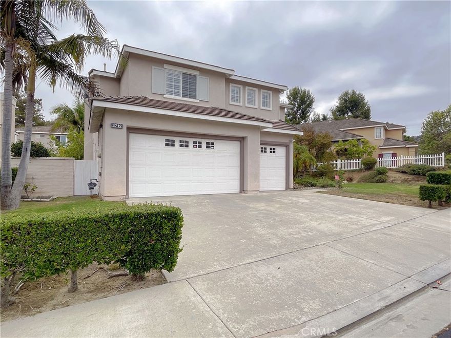 Beautiful 2-story single family residence, 4 Beds | 3.5 Baths | 3 Car garage (with Direct Access) | 2,922 sqft living | 7481 sqft lot | Build in 1994, located in the prestigious gated community of RIDGEMOOR, with attendant service at the main entrance.

The double-door front entrance leads to a high ceiling foyer, living room, and formal dining room, huge windows that allow lots of natural light. Gourmet kitchen features granite countertops, oversized center island, custom cabinets & appliances, and a cozy dining area. Kitchen also opens to a family/Great room with fireplace, and family/Great room door open to the backyard with lots of fruit trees, 1 bedroom suite downstairs is a plus, and individual laundry room has plenty of cabinets & shelving. The spiral staircase leads to the 2nd floor, where a spacious loft can easily be used as a lounge/reading area. The master suite features walk-in closets, his and hers vanities, a separate shower, and a soaking tub. A Jack and Jill bathroom is located between the 2 additional bedrooms.

Home is convenient to the shopping center, restaurants, parks, schools, and freeway.