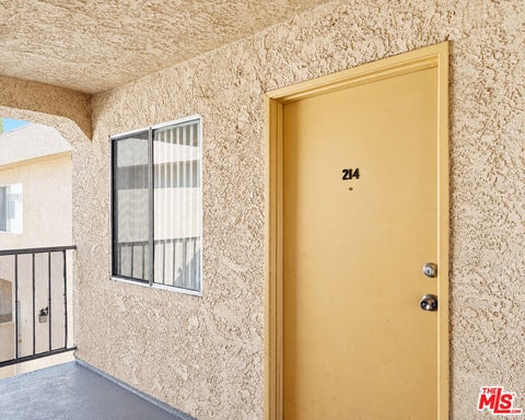 Photo of 16033 Vanowen ST #214, Van Nuys, CA 91406 (MLS # 26104597)