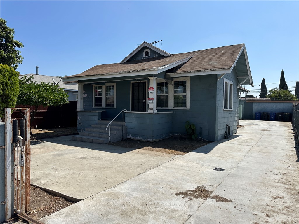 Bring your vision and toolbox...This 2-unit property is being sold As-Is and is perfect for an investor/contractor. Both units need repairs and updating - offering the chance to add significant value through renovation. Excellent potential for rental income or future resale. Convenient location near transportation, schools and shopping. Long driveway for parking.