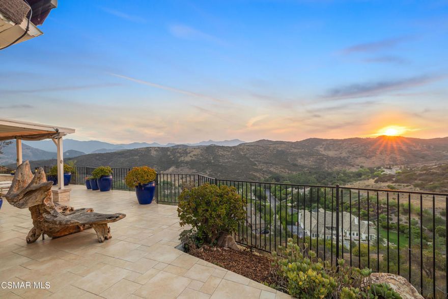 Top-of-the-Mountain Privacy  Sweeping Bird's-Eye Views  Fully Remodeled Luxury.   Perched on a premium view lot in the prestigious Ridgeview Estates of Westlake Village, this exquisitely reimagined residence offers rare elevated privacy, stunning panoramic views, and over $250,000 in recent upgrades. Fully transformed inside and out, the home features a brand-new HVAC system with in-attic furnace, exterior Bosch condenser, zoned climate control, all-new ductwork with added vents, and enhanced attic insulation from a full clean-out. A new tankless water heater provides on-demand efficiency, while a Halo 5 whole-house water filtration system ensures the highest water quality. The chef's kitchen is a showpiece with white shaker cabinetry, quartz countertops, soft-close drawers, a glass tile backsplash, professional-grade Viking range, and built-in Thermador refrigerator. Bathrooms have been fully remodeled, including a custom primary bath with an oversized shower featuring half-inch piping and three shower heads, a soaking tub framed by floor-to-ceiling picture windows, dual vanities, heated towel racks, and Toto bidet toilets in all three bathrooms. Additional upgrades include a downstairs fireplace overhaul, new wrought iron front and garage doors, custom wood staircase with wrought iron railings, added garage storage racks, and a custom walk-in primary closet with built-ins.  The open floor plan boasts vaulted ceilings, a formal dining room, and a warm family room with a stacked-stone fireplace. A downstairs bedroom and full bath offer ideal flexibility for guests, a home office, or multi-generational living. Upstairs, the primary suite is a true retreat with vaulted ceilings, a bay window, fireplace, and elegant custom moldings. Step outside to enjoy an expansive covered patio with a built-in fire pit, perfect for taking in the incredible views and starlit skies.  Ideally located just minutes from award-winning Conejo Valley schools, upscale shopping, dining, scenic hiking and biking trails, and the lake, this home perfectly blends luxury, comfort, and the best of Westlake Village living.