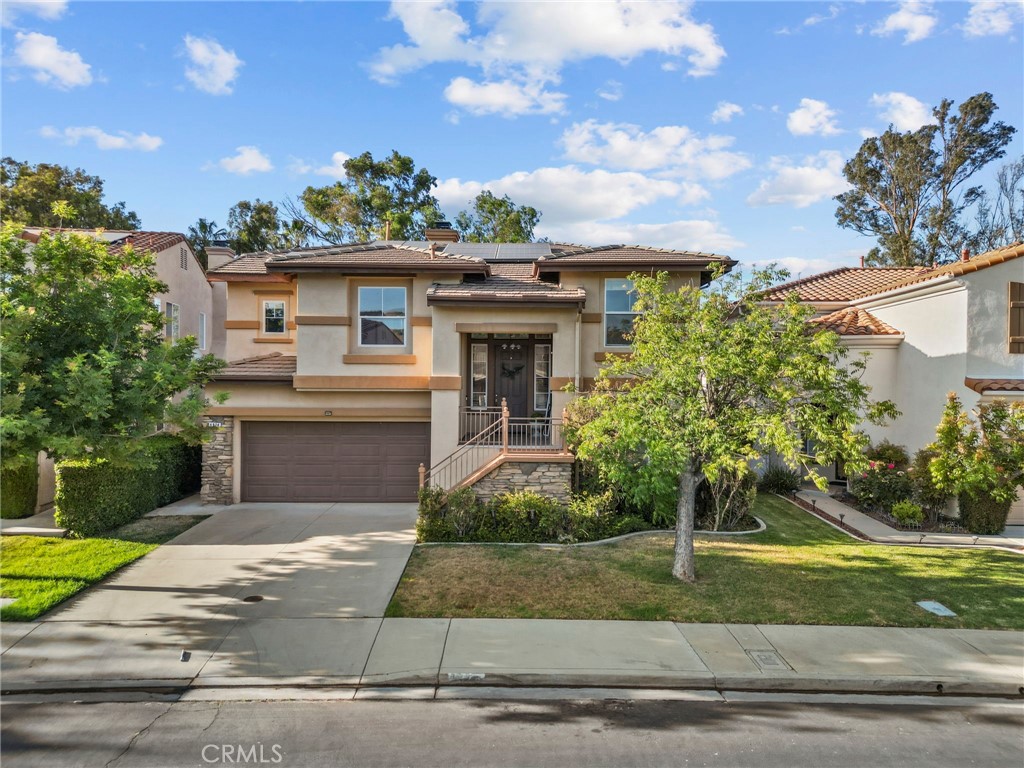 Welcome to 4978 Stone Ridge Drive, a beautifully maintained 5-bedroom, 3-bathroom home situated in one of Chino Hills’ most sought-after neighborhoods. Bathed in natural light with a desirable south-facing orientation, this 2,326 sqft residence features a private backyard with no neighbors behind—offering a peaceful retreat ideal for relaxing or entertaining. The expansive kitchen boasts ample storage and opens seamlessly to a spacious living area, perfect for gatherings of any size. Upstairs, the master suite offers a walk-in closet and double vanity, providing both comfort and convenience. This home features 17 pay-as-you-go solar panels, providing energy efficiency and potential savings on your monthly utility bills. Located within the highly rated Chino Valley Unified School District—serving top-performing schools like Chaparral Elementary and Chino Hills High—this home is a perfect fit for families. Enjoy close proximity to Western Hills Country Club, Los Serranos Golf Club, and a variety of premier shopping, dining, and grocery options. With its inviting layout, timeless finishes, cozy fireplace, and excellent future potential, this home delivers the ideal combination of lifestyle, location, and long-term value.