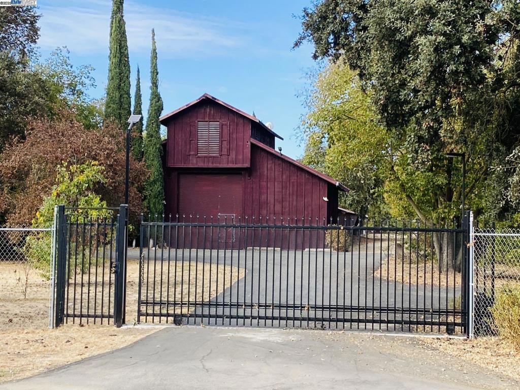 Situated in east Stockton quiet neighborhood. Ranch house with big living room and work room and 2 bed and 3 bath. Newly remodeled mobile home with 3 bed and 2 bath. Hugh barn has great potential. Yard is a nicely designed garden. Seller finance available.