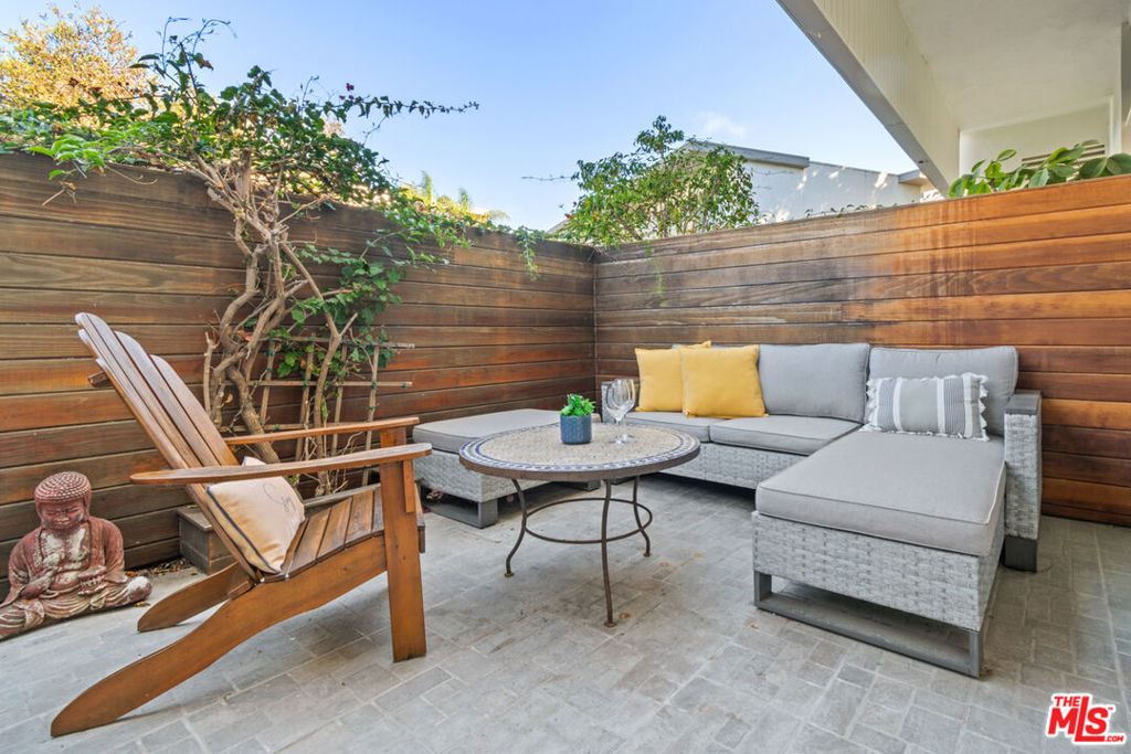 FULLY FURNISHED TOWNHOME - Flexible 6 to 11 MONTH Lease. WHERE COASTAL LIVING MEETS MODERN CONVENIENCE. Live the Marina del Rey lifestyle in this quiet, private community just steps from the Villa Marina Shopping Center. Enjoy trendy boutiques, gourmet dining, bike paths, parks, and easy access to Venice Beach, Abbot Kinney, and Santa Monica. Open multi-level layout with high ceilings and plantation shutters | Fully remodeled kitchen with granite countertops and stainless steel appliances | Primary suite with balcony, private bath, and ample closet space | Second bedroom with en-suite bath and large closet | Hardwood floors and decorative fireplace | Private patio with pool views | In-unit laundry | 55" TV with premium DirecTV package | Direct-access 2-car garage for added security and storage. Ideal for professionals or international clients seeking comfort and convenience | Just bring your suitcase this is turnkey coastal living at its best.