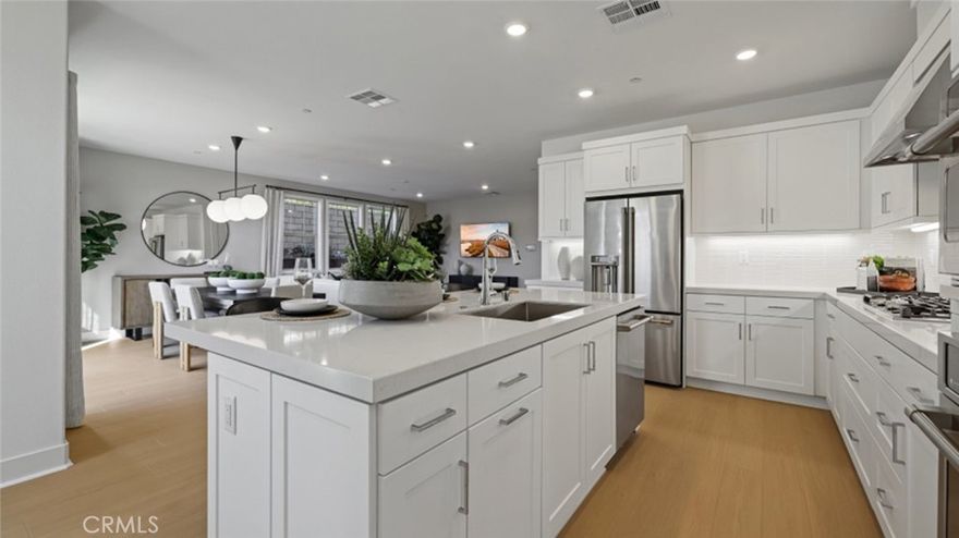 This stunning 2-story, 4 bedroom, 3 bathroom residence with loft, mud room, pantry and downstairs bedroom, offers the perfect blend of comfort and style. With a convenient 2-bay garage and additional exterior parking space, this home has all the space and convenience you need for modern living. Nestled in a vibrant community, you'll soon enjoy access to fantastic amenities including a sparkling pool, spa, a welcoming community center, and a sprawling 5-acre city park right in the neighborhood. Park will include 2 basketball courts, 4 pickle ball courts, bocce ball, dog park, bicycle trails and more! This home and its surrounding offer endless opportunities in a highly sought after, limited availability, established location, with excellent retail options just minutes away. Do not miss out on the chance to make this exceptional property your own.