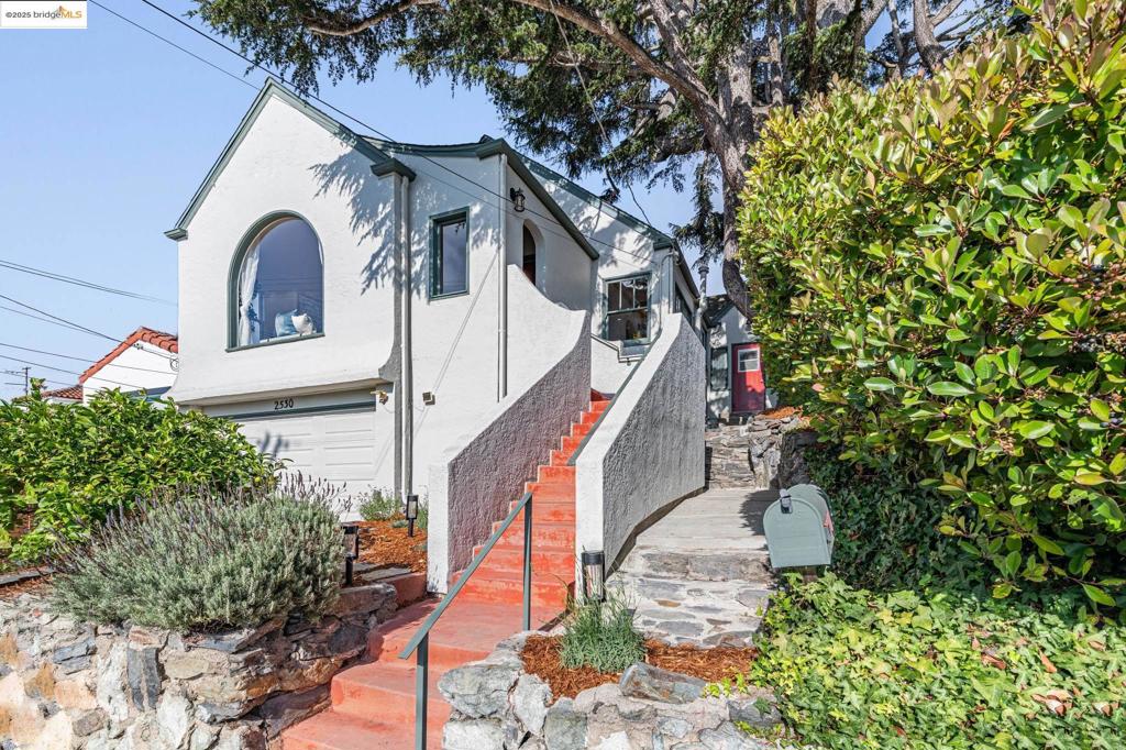 This dreamy mediterranean bungalow has just the right mix of classic charm and understated elegance, in the heart of much-loved Poinsett Park. Light streams in, dappled by trees all around, including a large sheltering cedar that almost feels like part of the home. A large picture window invites you to watch the sun set over the Golden Gate Bridge. Thoughtful 1929 design makes this home feel spacious and private, with high quality construction lovingly maintained by generations of owners. The three bedrooms each have ample closets, and the two full baths offer either an indulgent rain shower or a peaceful soak in a claw foot tub. The fenced backyard includes roomy stone and brick patios perfect for entertaining, nestled within a mature garden fed by a new custom irrigation system. A stone path leads to the basement, utility room, and garage that offer ample out-of-sight storage, and potential laundry, gym, or workshop space. Steps away you'll also find the neighborhood park, with grassy areas and paved courts where neighbors often chat and kids play. Nearby are also Tassajara Park, multiple trails, and all the restaurants and shops conveniently located on San Pablo Avenue. About a mile to either I-80 or the Del Norte BART station.