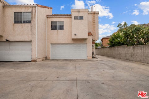 Photo of 14422 Terra Bella Street #A, Los Angeles, CA 91402 (MLS # 26871901)